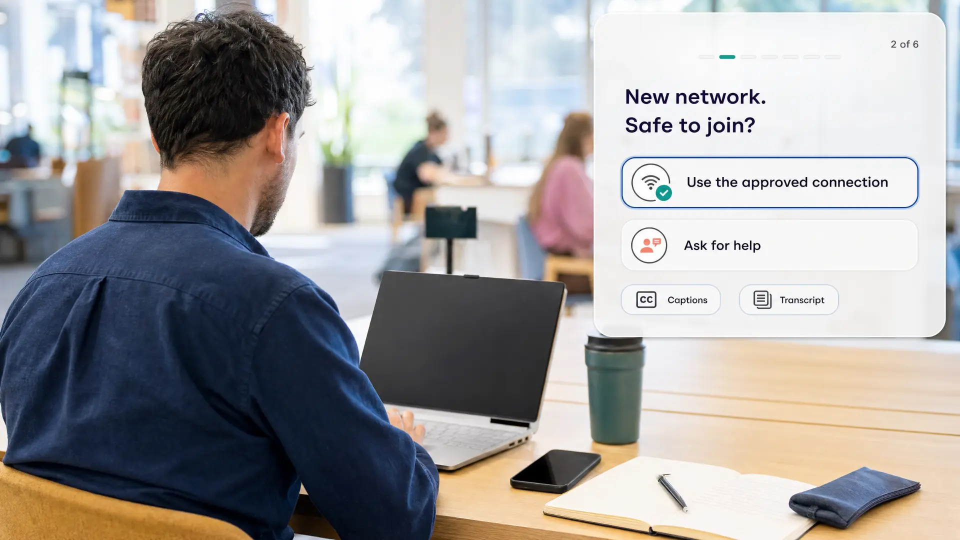 Illustrative module screen titled New network. Safe to join, with Use the approved connection and Ask for help options plus captions and transcript, over a photograph of a person on a laptop in a shared workspace.